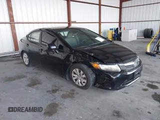 2012 Honda Civic LX z VIN 19XFB2F52CE101765, wystawiony jako IAAI lot #42191283 z przebiegiem 162 943 mil mil oraz . Historia ofert i sprzedaży dostępna na DreamBid. Obrazek 1.