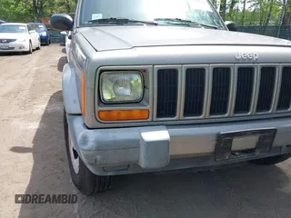 2000 Jeep Cherokee z VIN 1J4FF48S5YL138739, wystawiony jako IAAI lot #42109922 z przebiegiem 199 621 mil mil oraz . Historia ofert i sprzedaży dostępna na DreamBid. Obrazek 6.