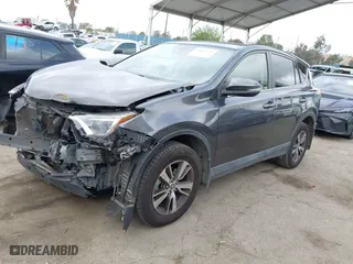 2018 Toyota RAV4 XLE with VIN JTMWFREV4JJ742463, listed as a IAAI auction lot 41920716 with 61,141 mi miles. Bid and sale history available at carsss.com. Image 17.