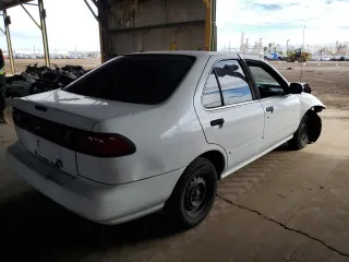 1997 Nissan Sentra XE with VIN 1N4AB41D9VC715071, listed as a Copart auction lot 84857134 with 162,357 mi miles and Salvage title. Bid and sale history available at DreamBid. Image 3.