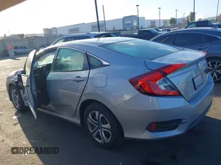 2018 Honda Civic LX with VIN 2HGFC2F58JH571072, listed as a IAAI auction lot 41684450 with 66,032 mi miles and . Bid and sale history available at carsss.com. Image 14.