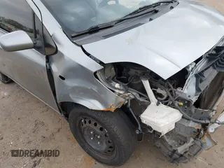 2010 Toyota Yaris with VIN JTDKT4K33A5314776, listed as a IAAI auction lot 41570383 with 167,428 mi miles. Bid and sale history available at carsss.com. Image 14.