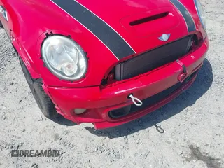 2013 MINI Hardtop S with VIN WMWSV3C50DT476088, listed as a IAAI auction lot 42534717 with 130,565 mi miles and . Bid and sale history available at DreamBid. Image 6.