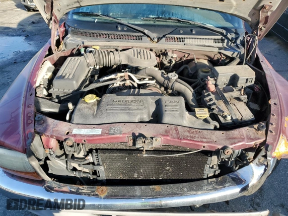 2000 Dodge Dakota SLT with VIN 1B7GG22X7YS639007, listed as a Copart auction lot 84829204 with 148,408 mi miles and Salvage Title. Bid and sale history available at DreamBid. Image 11.