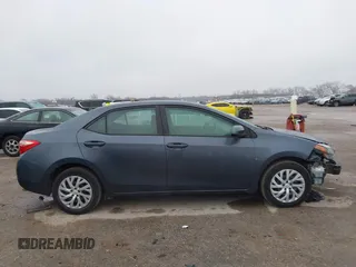 2018 Toyota Corolla L z VIN 5YFBURHE7JP831763, wystawiony jako IAAI lot #41539485 z przebiegiem 95 495 mil mil oraz . Historia ofert i sprzedaży dostępna na DreamBid. Obrazek 14.