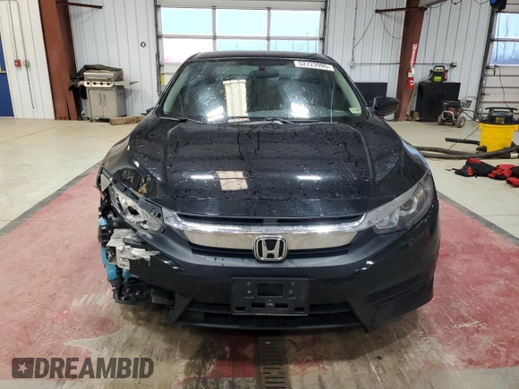 2016 Honda Civic Sedan LX with VIN 19XFC2F50GE212785, listed as a Copart auction lot 52723995 with 146,097 mi miles and Salvage Title. Bid and sale history available at carsss.com. Image 5.
