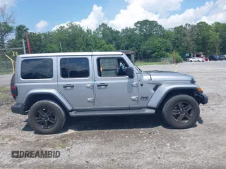 2021 Jeep Wrangler Unlimited Sahara with VIN 1C4HJXEN3MW628845, listed as a IAAI auction lot 42438049 with 49,970 mi miles and . Bid and sale history available at DreamBid. Image 13.