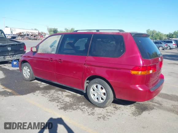 2004 Honda Odyssey EX with VIN 5FNRL18644B122591, listed as a IAAI auction lot 42207036 with 166,179 mi miles and . Bid and sale history available at DreamBid. Image 3.