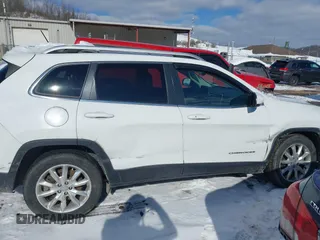 2015 Jeep Cherokee Limited with VIN 1C4PJMDS9FW718151, listed as a IAAI auction lot 41344018 with 124,185 mi miles and . Bid and sale history available at DreamBid. Image 13.
