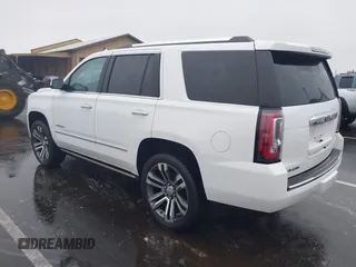 2018 GMC Yukon Denali with VIN 1GKS2CKJ8JR274087, listed as a IAAI auction lot 41097872 with 76,828 mi miles. Bid and sale history available at carsss.com. Image 3.