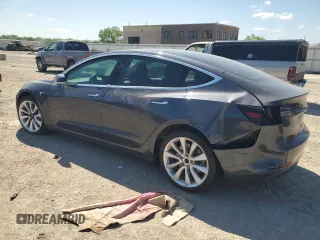 2018 Tesla Model 3 Long Range Battery z VIN 5YJ3E1EB4JF116531, wystawiony jako Copart lot #55609755 z przebiegiem 63 695 mil mil oraz Szkody całkowita. Historia ofert i sprzedaży dostępna na DreamBid. Obrazek 2.