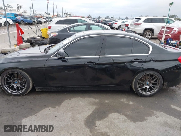 2018 BMW 3 Series 330i xDrive with VIN WBA8D9G57JNU67415, listed as a IAAI auction lot 41513343 with 98,714 mi miles. Bid and sale history available at carsss.com. Image 14.