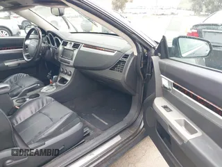 2009 Chrysler Sebring Limited with VIN 1C3LC65V39N552902, listed as a IAAI auction lot 41993719 with 142,143 mi miles and . Bid and sale history available at DreamBid. Image 5.