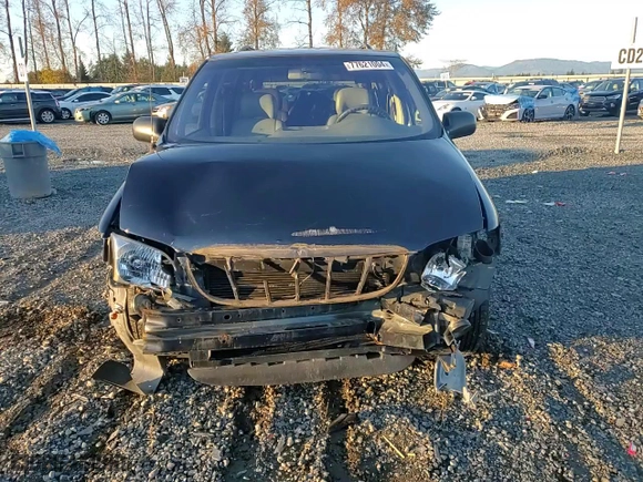 1999 Chevrolet Venture with VIN 1GNDX03E6XD330398, listed as a Copart auction lot 77621004 with 80,625 mi miles and Salvage Title. Bid and sale history available at carsss.com. Image 12.