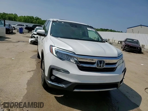 2022 Honda Pilot Elite with VIN 5FNYF6H08NB059590, listed as a Copart auction lot 57460235 with 67,593 mi miles and Salvage title. Bid and sale history available at DreamBid. Image 15.