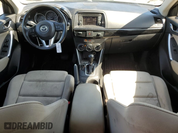2014 Mazda CX-5 Touring with VIN JM3KE4CY4E0407868, listed as a Copart auction lot 52564315 with 137,989 mi miles and Salvage Title. Bid and sale history available at carsss.com. Image 8.