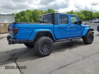 2021 Jeep Gladiator Freedom с VIN 1C6HJTAG7ML553303, выставлен на аукционе Copart как лот 57038585 с пробегом 49 400 миль миль и Списание • Salvage title. История ставок и продаж доступна на DreamBid. Изображение 3.