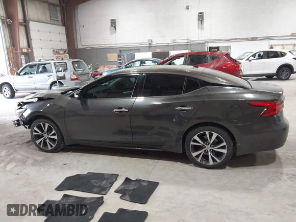 2016 Nissan Maxima Platinum with VIN 1N4AA6AP3GC404618, listed as a IAAI auction lot 42372458 with 133,968 mi miles and . Bid and sale history available at DreamBid. Image 14.