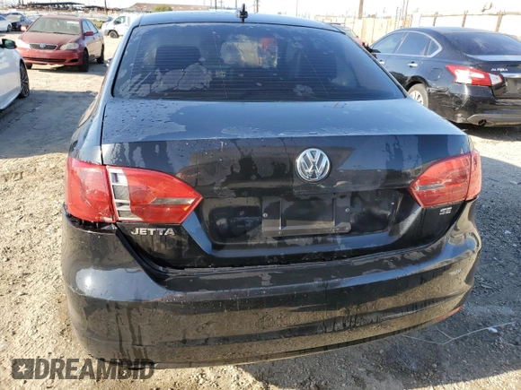 2014 Volkswagen Jetta SE z VIN 3VWD17AJXEM374051, wystawiony jako Copart lot #50261485 z przebiegiem 138 282 mil mil oraz Szkoda całkowita • Salvage title. Historia ofert i sprzedaży dostępna na DreamBid. Obrazek 6.