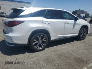 2022 Lexus RX 350L с VIN JTJHZKEAXN2029004, выставлен на аукционе Copart как лот 57858485 с пробегом 94 701 миль миль и Списание • Salvage title. История ставок и продаж доступна на DreamBid. Изображение 3.