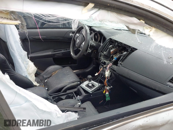 2014 Mitsubishi Lancer Evolution MR with VIN JA32W5FV7EU008165, listed as a IAAI auction lot 41553978 with 49,284 mi miles. Bid and sale history available at carsss.com. Image 5.
