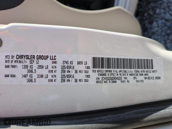 2013 Dodge Grand Caravan Crew with VIN 2C4RDGDG6DR549225, listed as a Copart auction lot 49479425 with 111,012 mi miles and Salvage Title. Bid and sale history available at DreamBid. Image 13.