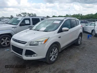 2015 Ford Escape Titanium with VIN 1FMCU0J99FUB92563, listed as a IAAI auction lot 42649556 with 183,199 mi miles and . Bid and sale history available at DreamBid. Image 6.
