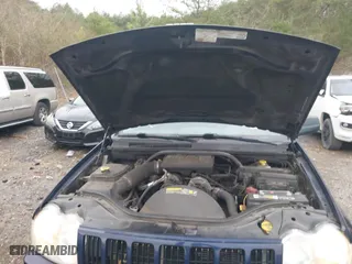 2006 Jeep Grand Cherokee Laredo with VIN 1J4GS48K76C187681, listed as a IAAI auction lot 41724035 with 194,781 mi miles. Bid and sale history available at carsss.com. Image 9.