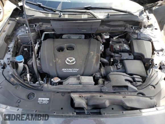 2018 Mazda CX-5 Grand Touring z VIN JM3KFBDM4J0300519, wystawiony jako Copart lot #51548745 z przebiegiem 102 853 mil mil oraz Szkoda całkowita • Salvage title. Historia ofert i sprzedaży dostępna na DreamBid. Obrazek 12.