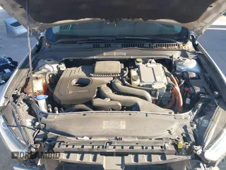 2014 Ford Fusion SE Hybrid with VIN 3FA6P0LU2ER319451, listed as a IAAI auction lot 41998180 with 170,191 mi miles. Bid and sale history available at carsss.com. Image 10.