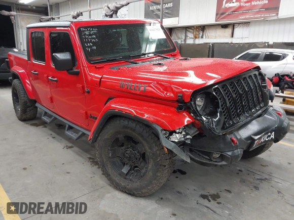 2022 Jeep Gladiator Altitude z VIN 1C6HJTAGXNL117353, wystawiony jako IAAI lot #42427921 z przebiegiem 28 801 mil mil oraz . Historia ofert i sprzedaży dostępna na DreamBid. Obrazek 1.