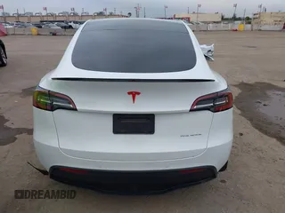 2021 Tesla Model Y Long Range with VIN 5YJYGDEE0MF209045, listed as a IAAI auction lot 41762738 with 24,721 mi miles. Bid and sale history available at carsss.com. Image 17.