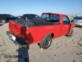 1994 Nissan Frontier with VIN 1N6SD11SXRC360680, listed as a Copart auction lot 84196824 with 105,338 mi miles and Salvage title. Bid and sale history available at DreamBid. Image 3.