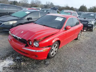 2002 Jaguar X-Type with VIN SAJEA51C22WC54063, listed as a IAAI auction lot 41404835 with NaN miles. Bid and sale history available at carsss.com. Image 17.