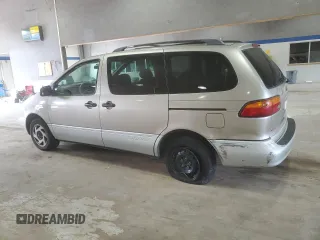 2000 Toyota Sienna LE z VIN 4T3ZF13C6YU210501, wystawiony jako Copart lot #56510955 z przebiegiem 253 950 mil mil oraz Szkody całkowita. Historia ofert i sprzedaży dostępna na DreamBid. Obrazek 2.