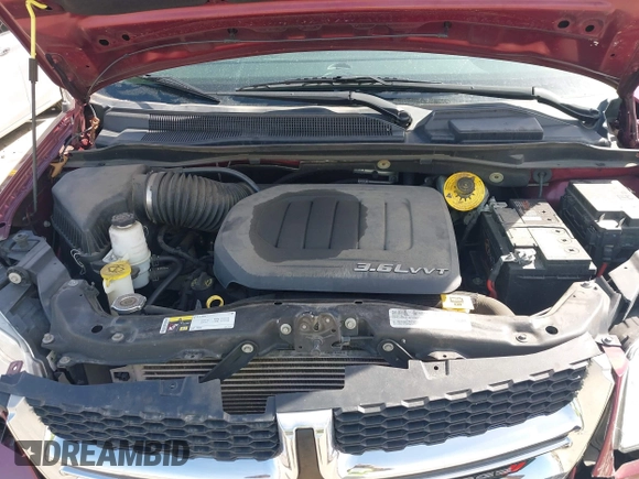2018 Dodge Grand Caravan SE Plus with VIN 2C4RDGBG2JR188185, listed as a IAAI auction lot 41832570 with 80,072 mi miles and . Bid and sale history available at DreamBid. Image 10.