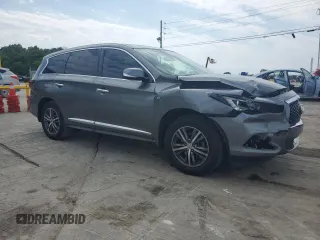 2019 Infiniti QX60 Pure with VIN 5N1DL0MN9KC566203, listed as a Copart auction lot 57137775 with 128,234 mi miles and Salvage title. Bid and sale history available at DreamBid. Image 4.
