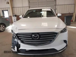 2017 Mazda CX-9 Grand Touring with VIN JM3TCADY5H0132572, listed as a IAAI auction lot 41421008 with 66,656 mi miles and . Bid and sale history available at DreamBid. Image 12.