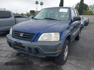 1999 Honda CR-V LX with VIN JHLRD1745XC014868, listed as a IAAI auction lot 41775272 with 212,835 mi miles. Bid and sale history available at carsss.com. Image 17.