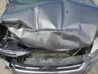 2013 Ford Escape Titanium z VIN 1FMCU9J90DUA72264, wystawiony jako Copart lot #49906445 z przebiegiem 126 527 mil mil oraz Szkoda całkowita • Salvage title. Historia ofert i sprzedaży dostępna na DreamBid. Obrazek 12.