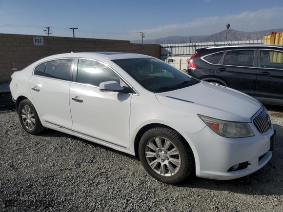 2013 Buick LaCrosse Premium 2 with VIN 1G4GH5E30DF303334, listed as a Copart auction lot 47052065 with 122,479 mi miles and Salvage Title. Bid and sale history available at carsss.com. Image 4.