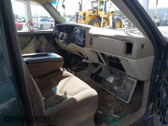 2003 GMC Yukon SLT z VIN 1GKEC13V43J304588, wystawiony jako IAAI lot #41525446 z przebiegiem Nie podano mil oraz . Historia ofert i sprzedaży dostępna na DreamBid. Obrazek 5.