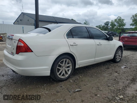 2012 Ford Fusion SEL with VIN 3FAHP0JA0CR249382, listed as a Copart auction lot 61173215 with 220,214 mi miles and Salvage title. Bid and sale history available at DreamBid. Image 3.