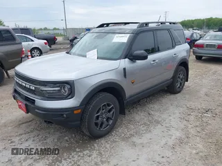 2021 Ford Bronco Sport Badlands z VIN 3FMCR9D99MRA67830, wystawiony jako IAAI lot #42318934 z przebiegiem 129 598 mil mil oraz . Historia ofert i sprzedaży dostępna na DreamBid. Obrazek 2.