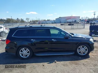 2014 Mercedes-Benz GL-Class GL 450 with VIN 4JGDF7CEXEA277610, listed as a IAAI auction lot 41909424 with 164,437 mi miles. Bid and sale history available at carsss.com. Image 13.
