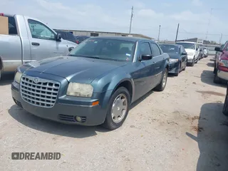 2006 Chrysler 300 Touring with VIN 2C3KA53G16H151319, listed as a IAAI auction lot 41917412 with 245,741 mi miles. Bid and sale history available at carsss.com. Image 2.