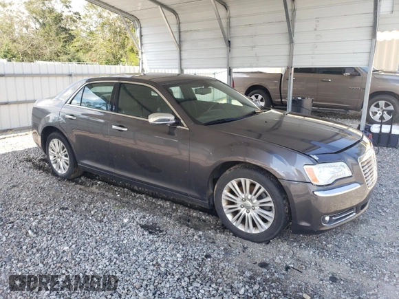 2014 Chrysler 300 C with VIN 2C3CCAKT7EH290150, listed as a Copart auction lot 73772864 with 162,952 mi miles and Salvage Title. Bid and sale history available at DreamBid. Image 4.
