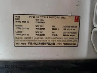 2015 Tesla Model S 85D with VIN 5YJSA1H24FF092628, listed as a Copart auction lot 51959035 with 128,744 mi miles and Salvage Title. Bid and sale history available at carsss.com. Image 12.