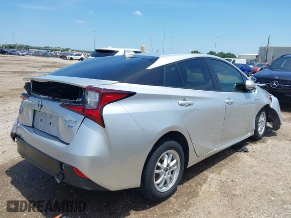 2022 Toyota Prius L Eco with VIN JTDKAMFU4N3170522, listed as a IAAI auction lot 42351817 with 90,561 mi miles and . Bid and sale history available at DreamBid. Image 4.