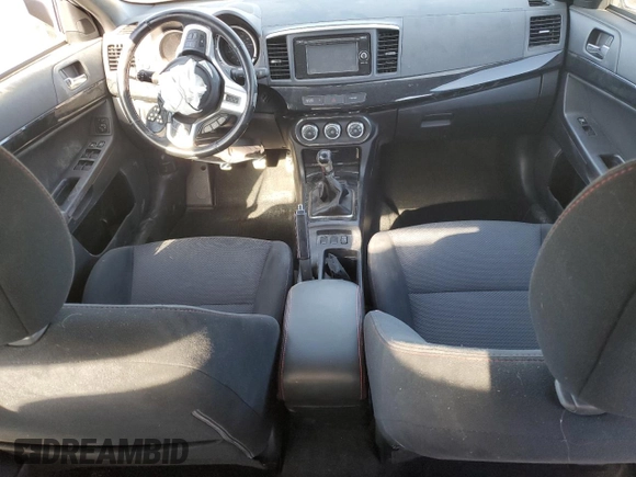 2015 Mitsubishi Lancer Evolution Final Edition z VIN JA32W7FV0FU027962, wystawiony jako Copart lot #85763774 z przebiegiem 56 671 mil mil oraz Szkoda całkowita • Salvage title. Historia ofert i sprzedaży dostępna na DreamBid. Obrazek 8.